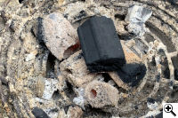 We kept the temperature low by burning just a few pieces of extruded coconut charcoal.