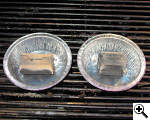 Side by side comparison of old and new Kamado extruded coconut charcoal