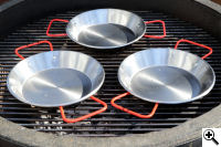 The three 20cm paelleras on the cooker.