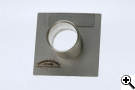 The blower adapter for a large Big Green Egg cooker.