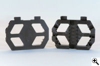 The two cable organizers that come with the Flame Boss 500, front and back views.