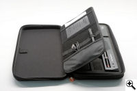 The other side of the case that stores the antenna and micro-USB cord.