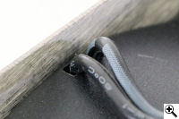 The original Pit Viper's cable entered via a small rectangular hole.