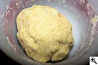 Rustic savory galette dough formed in the bowl.