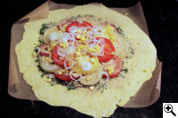 Rustic savory galette tomatoes onions corn garlic.
